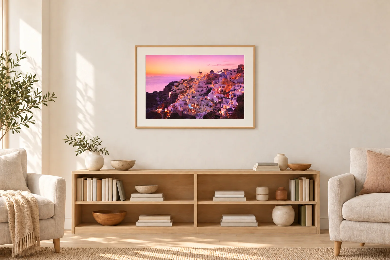 Illustrative mockup: An Aegean Evening as an 80 × 53.3 cm photograph with an off-white mat and ash frame above a bookcase in a reading room.