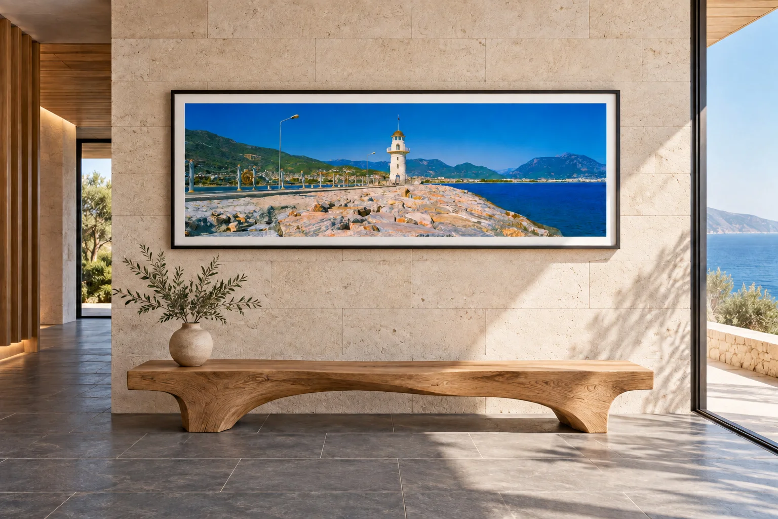 Illustrative mockup of the lighthouse panorama in a black frame above an oak bench in a limestone and slate reception hall.